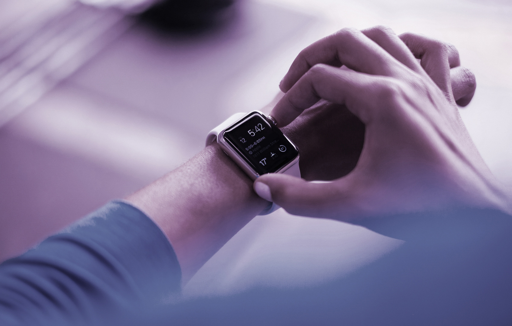 Person checking smartwatch